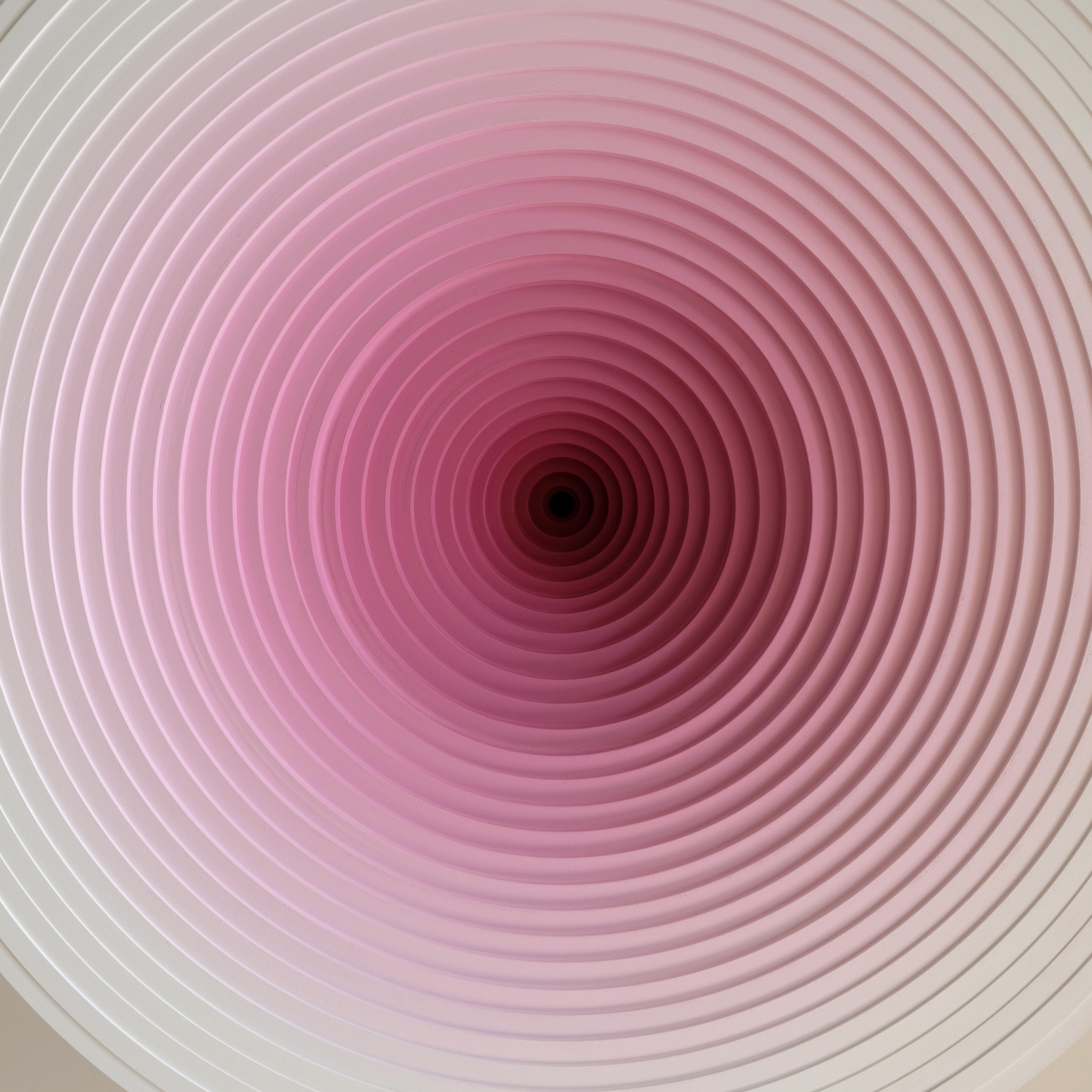 Pink and red concentric relief