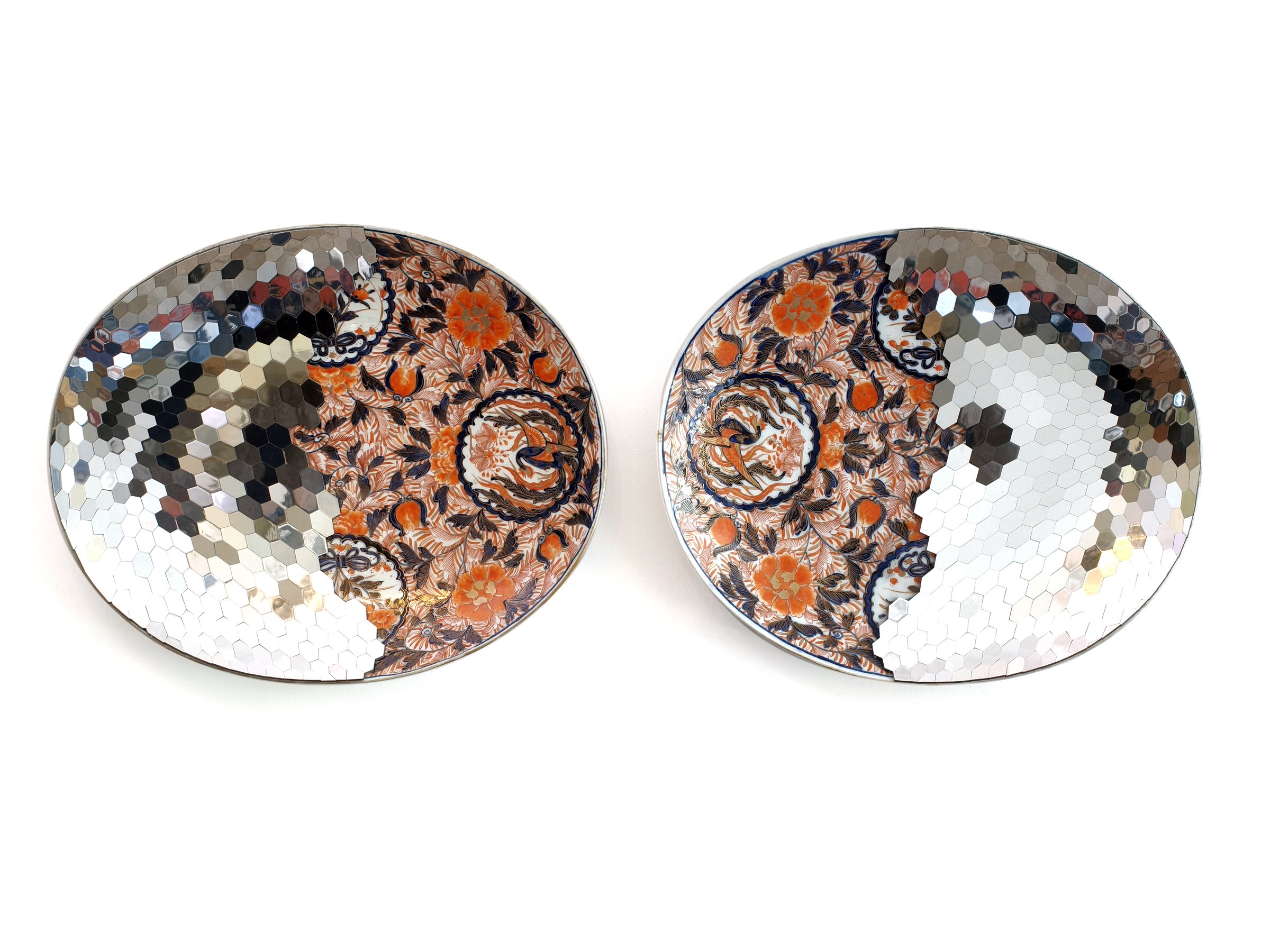 Two Imari plates with mirrored sections